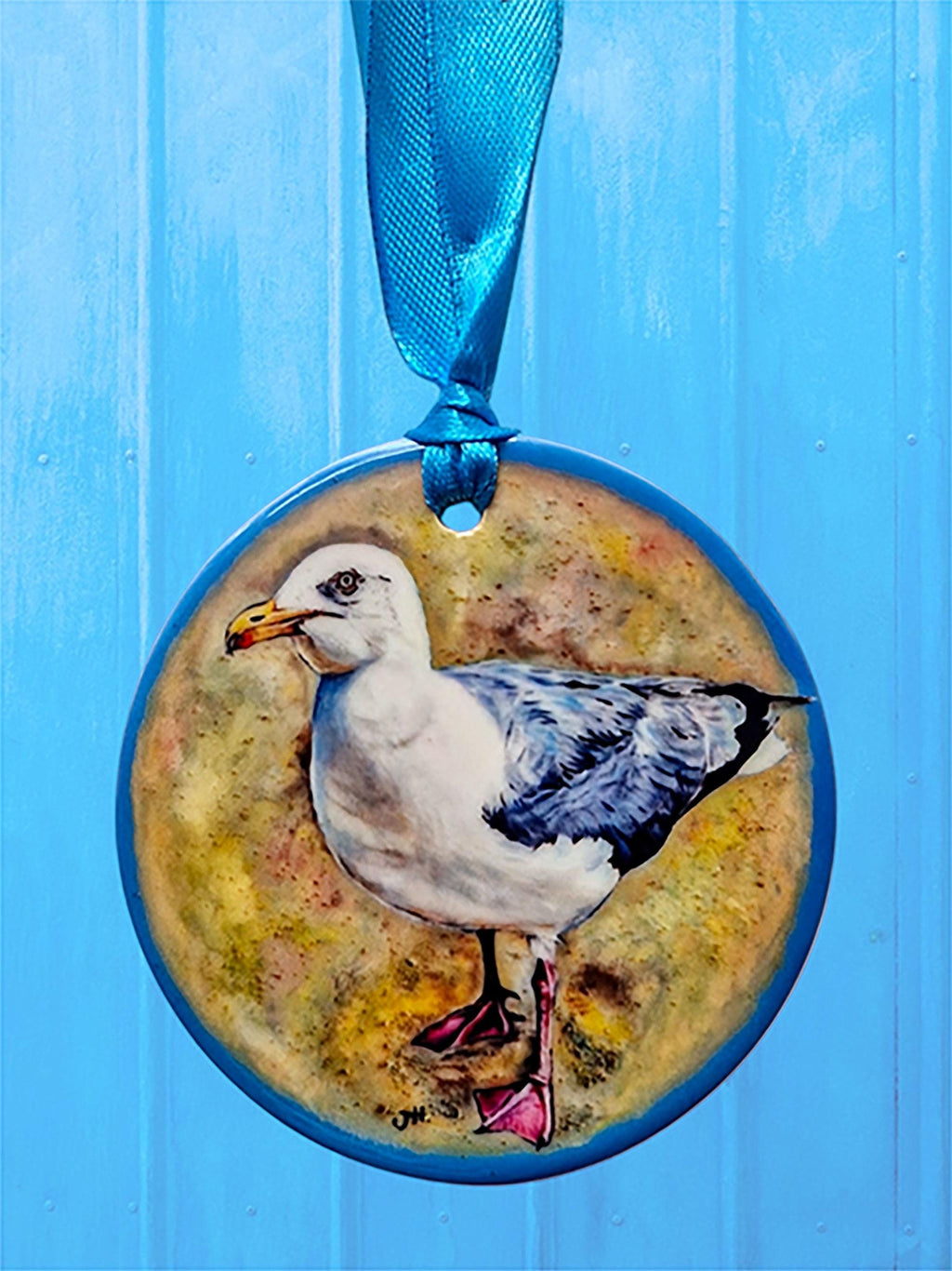 Ceramic disc hanging ornaments depicting a collection of fun and festive animals - all from original oils by Jess Harris