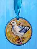 Ceramic disc hanging ornaments depicting a collection of fun and festive animals - all from original oils by Jess Harris