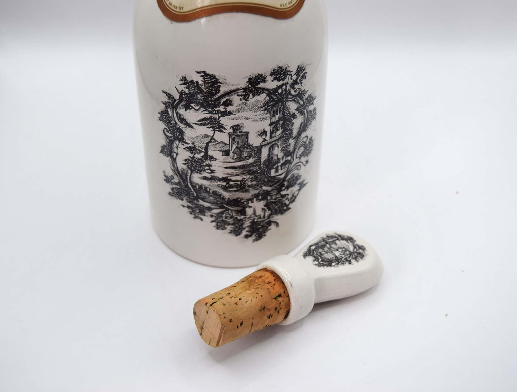 Decorative bottle with cork on a white background