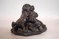 vintage cold cast bronze resin figurine of two boxer puppies, made by the British company Heredities.