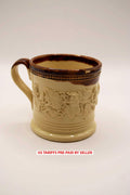 A rare, classic small children's 19th c. English Staffordshire pottery salt glaze cup, mug or coffee can embellished with flowers, l