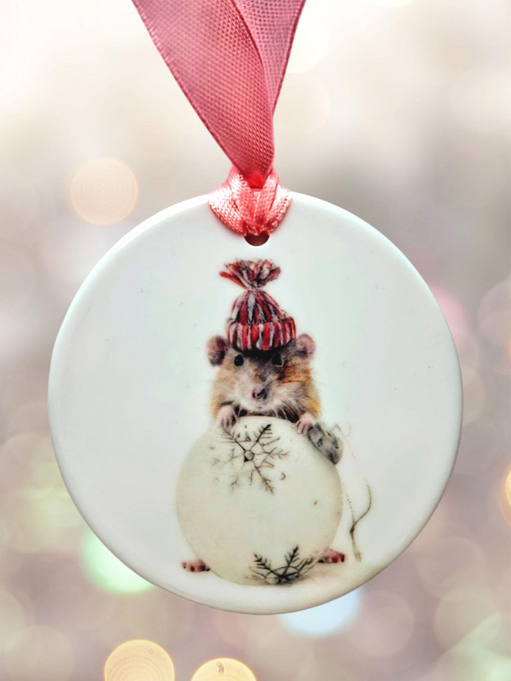 Ceramic disc hanging ornaments depicting a collection of fun and festive animals - all from original oils by Jess Harris