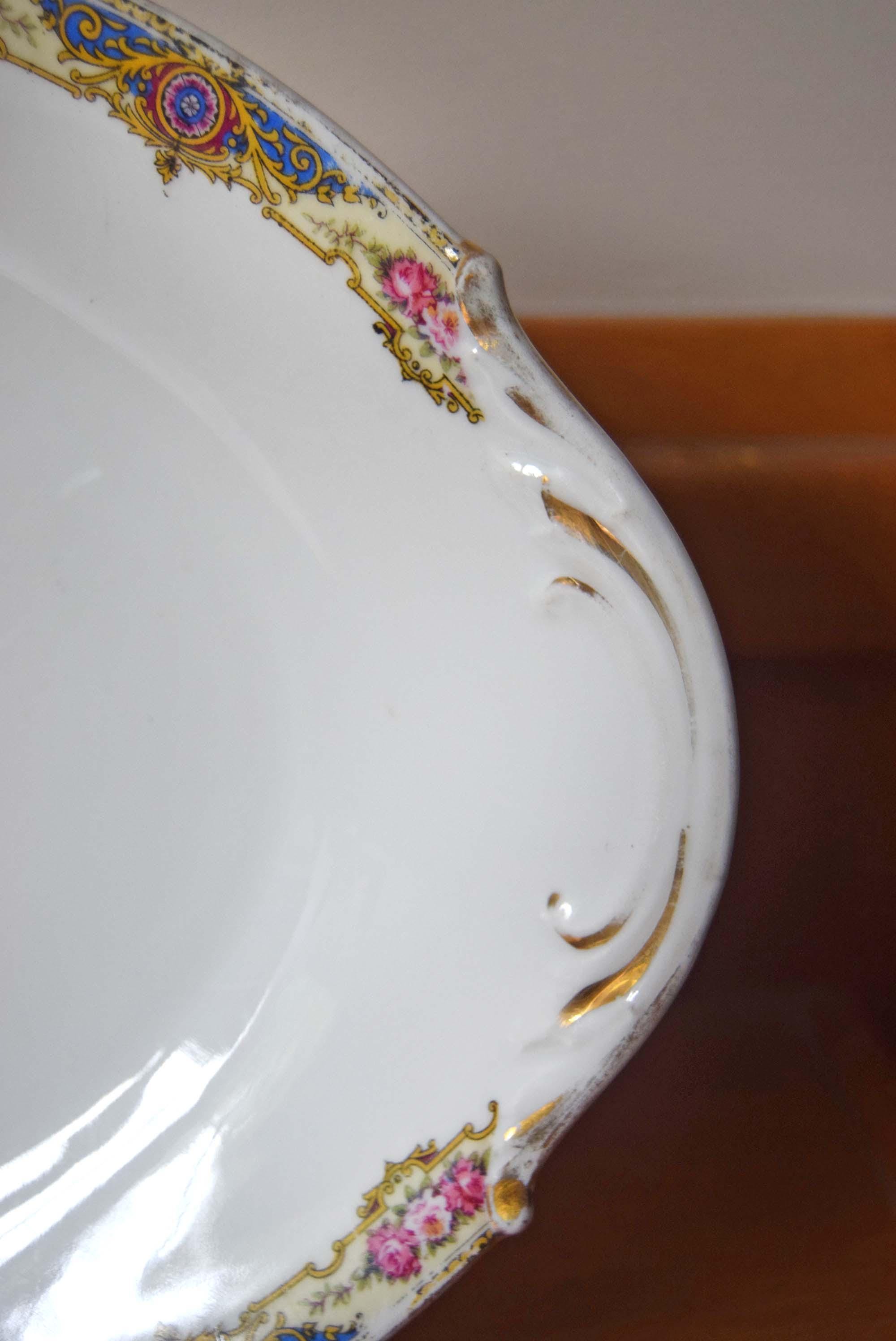 16-inch "Grand" oval serving platter. Manufactured by the prestigious F. Legrand &amp; Cie in Limoges, France, this piece features authentic period backstamps that date it to approximately 1924.