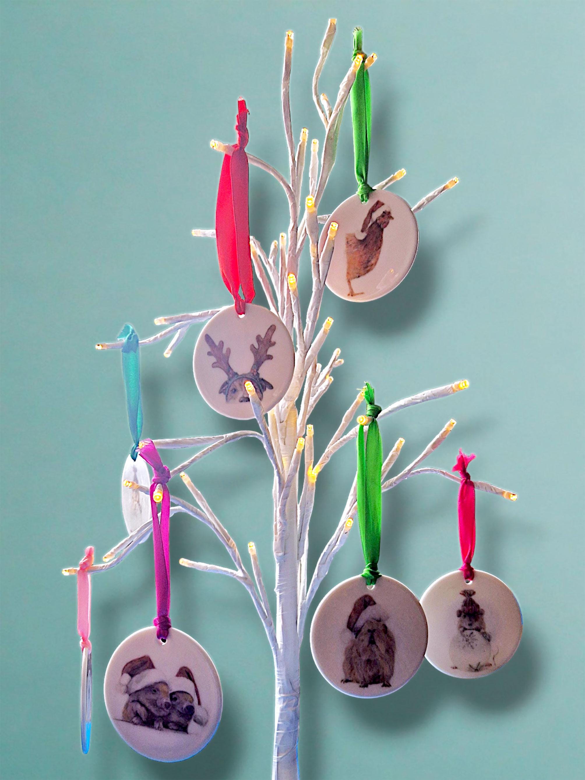 Ceramic disc decorations by Jess Harris, Pet and Portrait Artist. Animal Characters