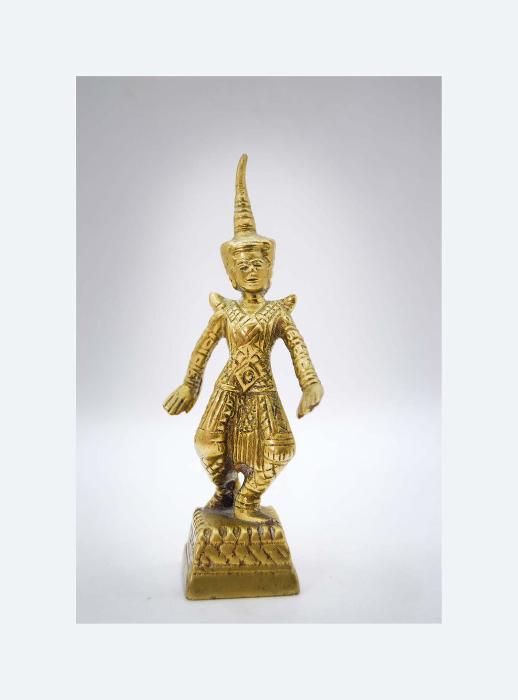 Brass Siam Thai Khon dancer figurine on a white background