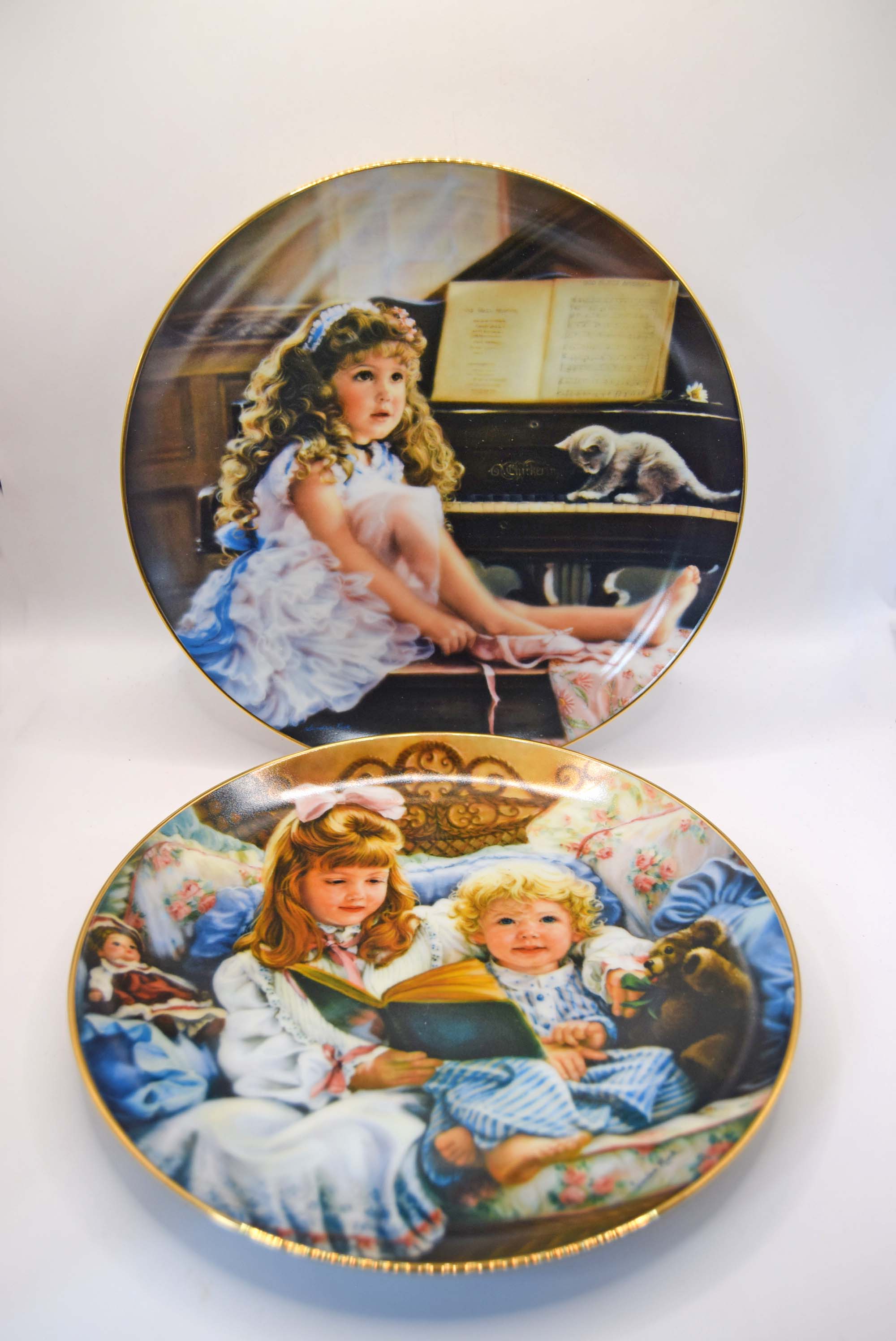 "Night-Time Story" (1987) – Features a young girl reading a book to her toddler sibling in a cozy bed surrounded by a doll and teddy bear.&nbsp;
"The Rehearsal" (1988) – Features a barefoot little girl sitting on a piano bench next to an adorable gray kitten.  