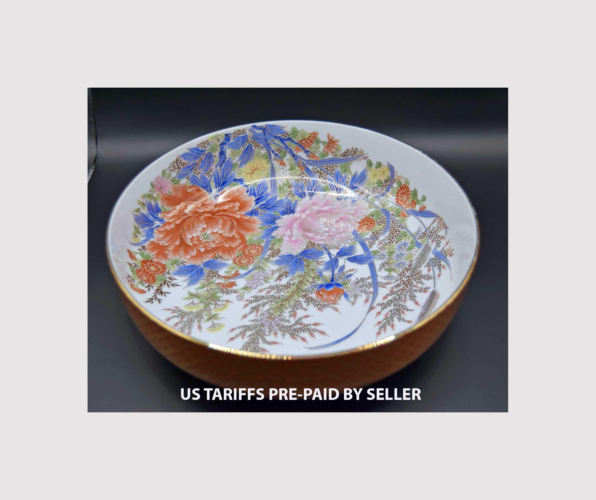 Decorative plate with floral design on a plain background