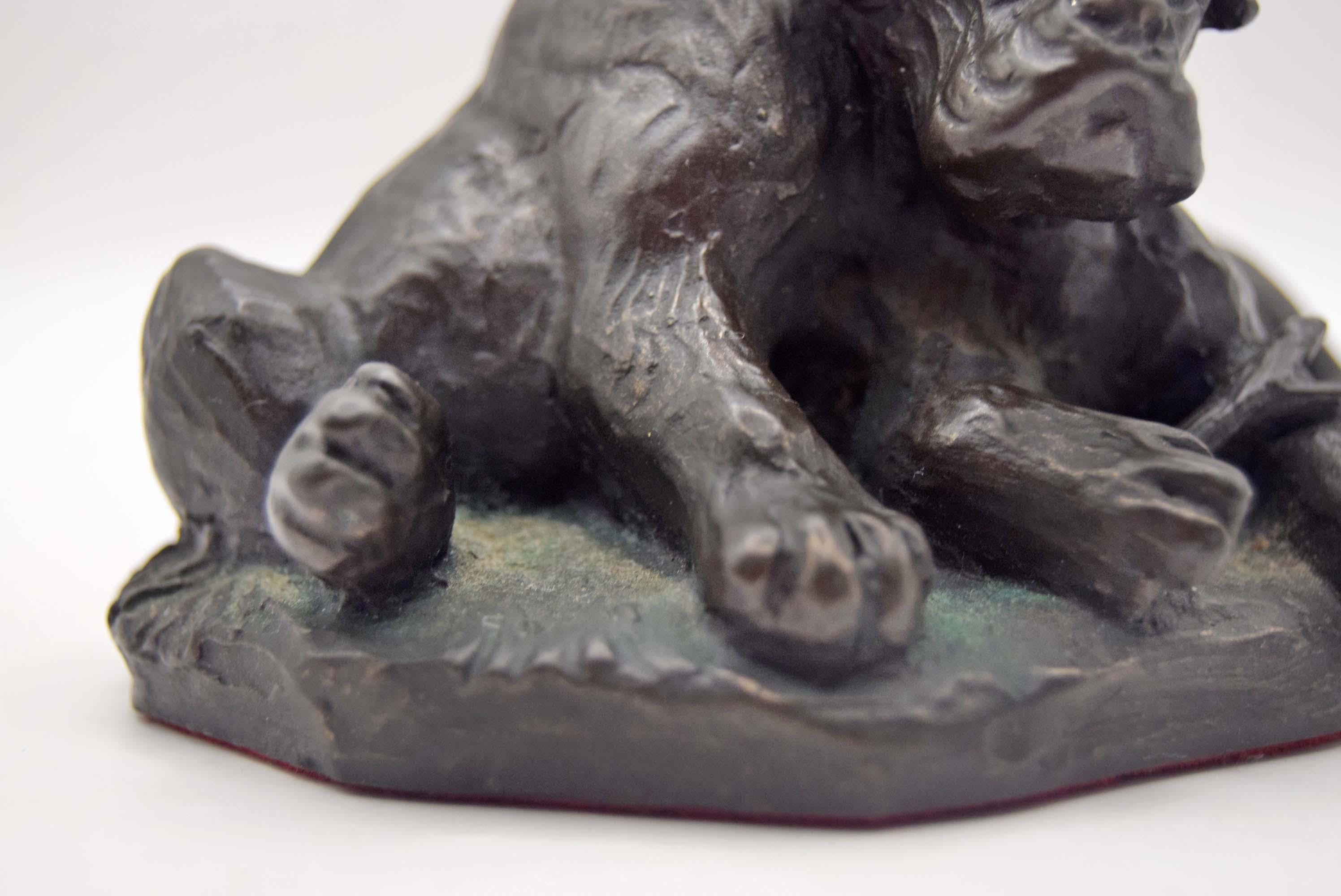 vintage cold cast bronze resin figurine of two boxer puppies, made by the British company Heredities.