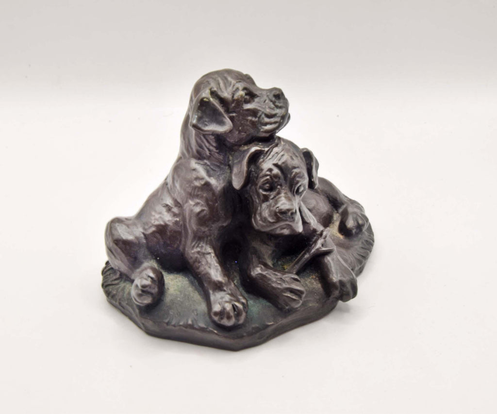 vintage cold cast bronze resin figurine of two boxer puppies, made by the British company Heredities.