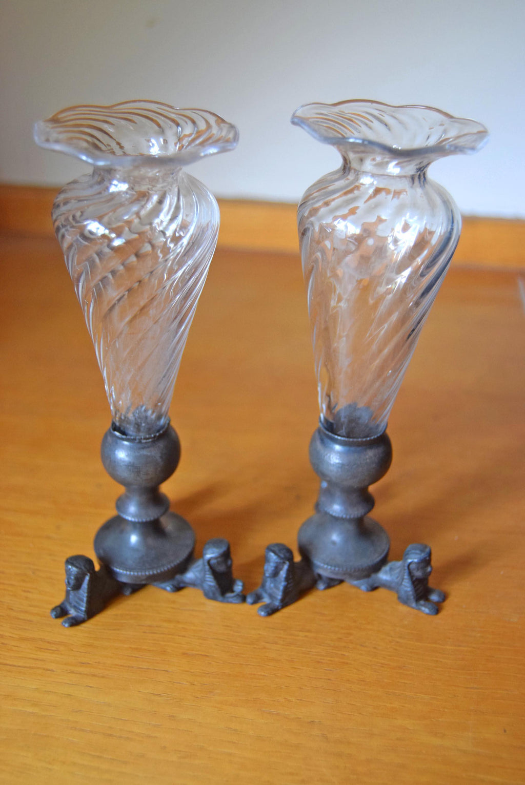 Pair of 19th century French Egyptian Revival trumpet vases with sphinx tripod bases