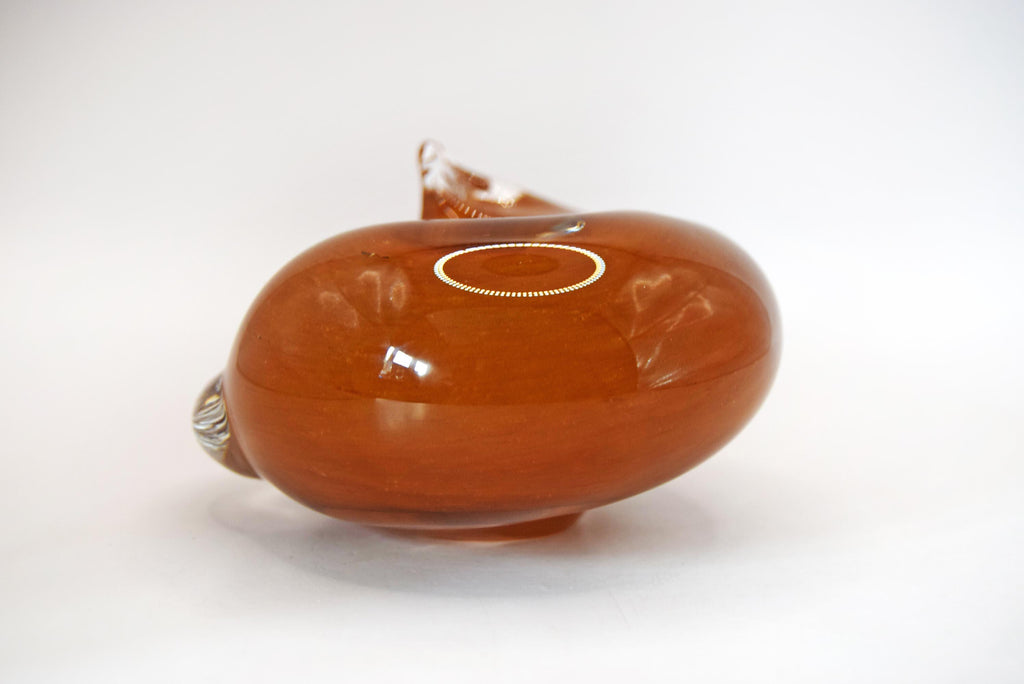 Vintage handblown art glass sleeping cat figurine/paperweight. Handcrafted by the renowned Langham Glass studio in Norfolk, England, this piece features a beautifully stylized, tightly curled feline silhouette.