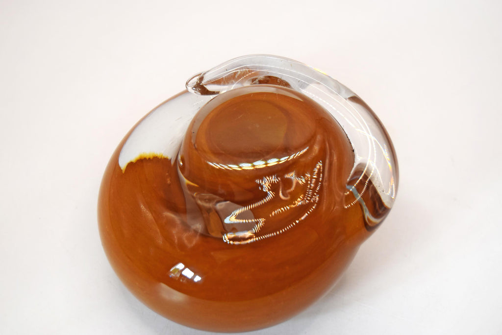 Vintage handblown art glass sleeping cat figurine/paperweight. Handcrafted by the renowned Langham Glass studio in Norfolk, England, this piece features a beautifully stylized, tightly curled feline silhouette.